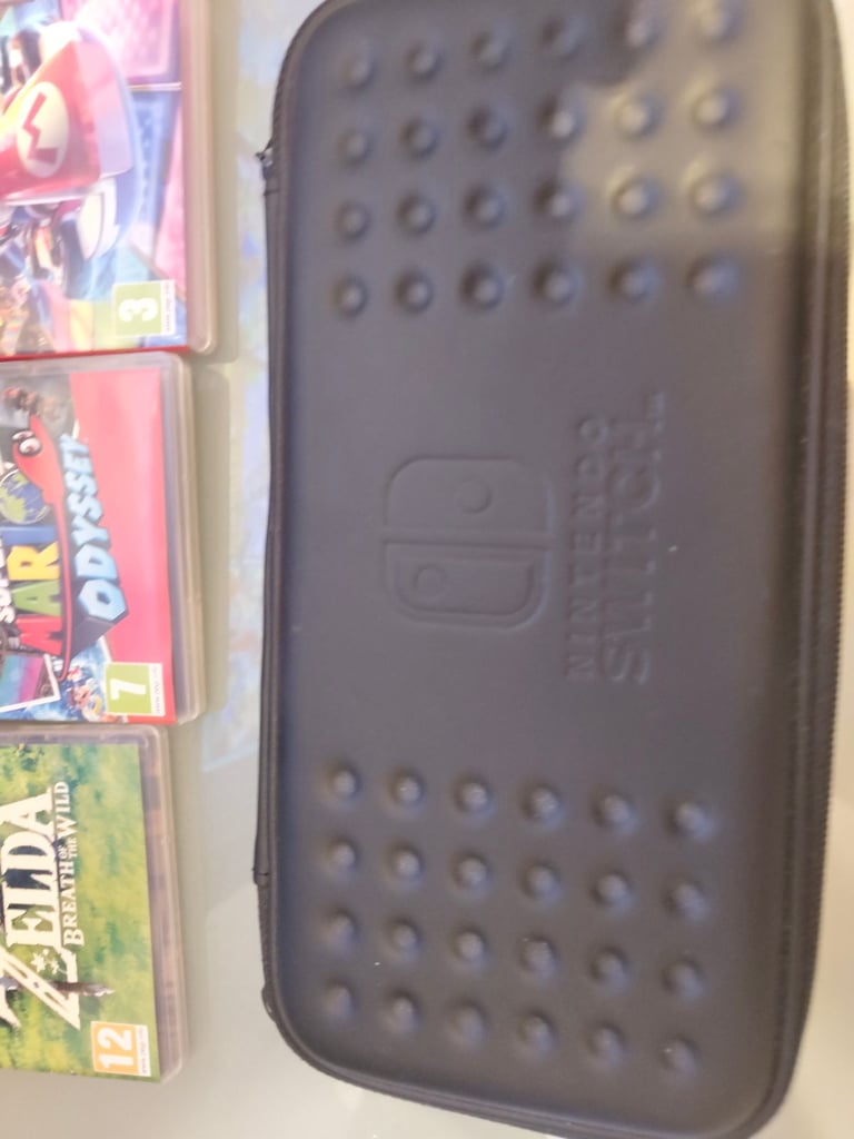 Nintendo Switch 32GB with Games and Pro Controller - Very Good Condition