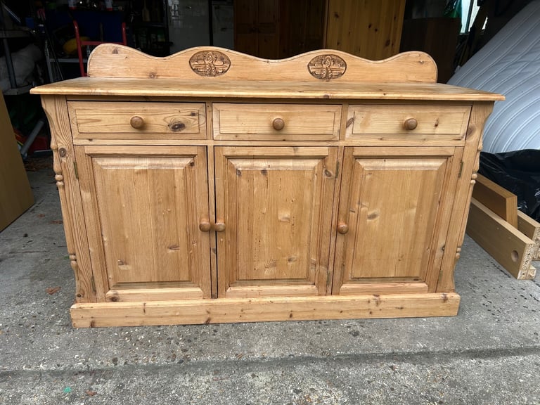 image for Solid chunky pine sideboard. Ornate carvings. Possible delivery 