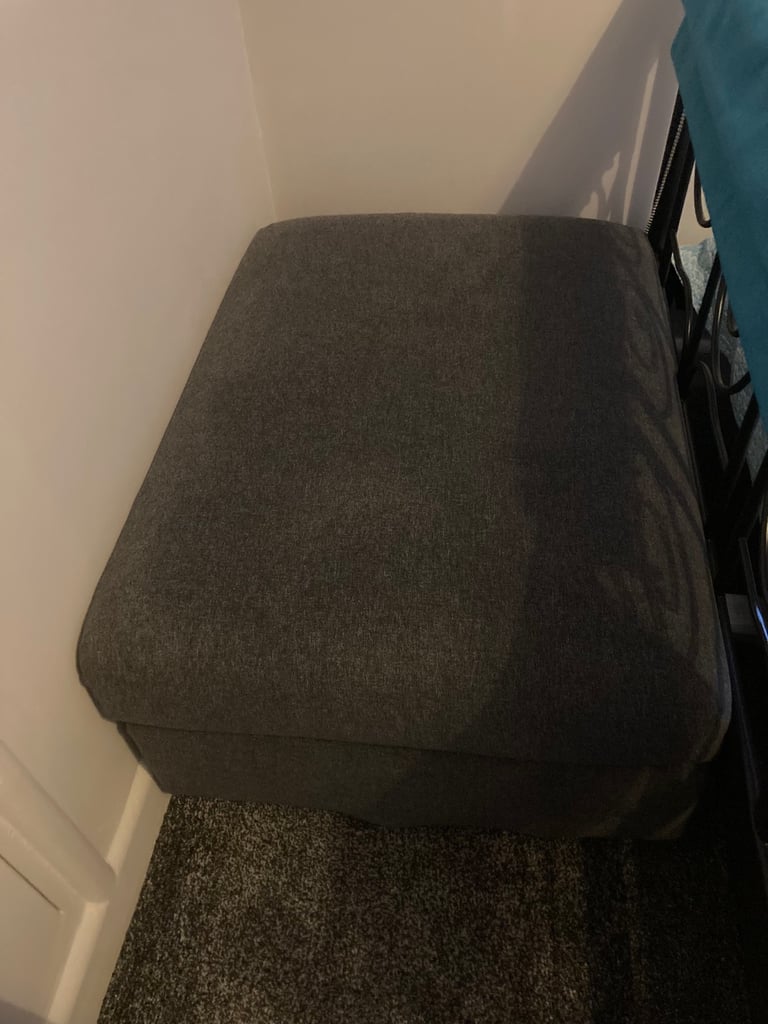 Grey fabric ottoman storage box