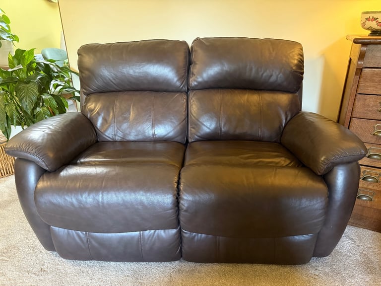 Leather two seater reclining sofa