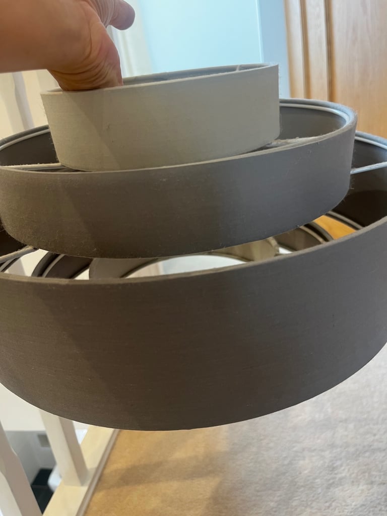Two grey lampshades 