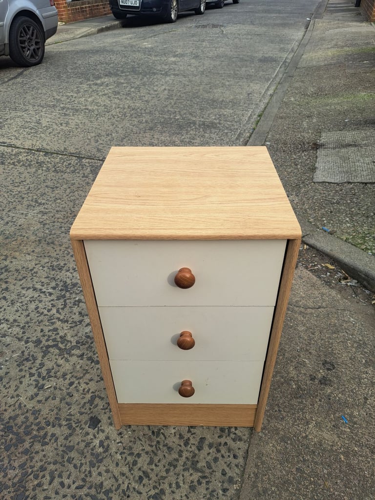 3 drawer bedside drawers with wood surround and cream drawers