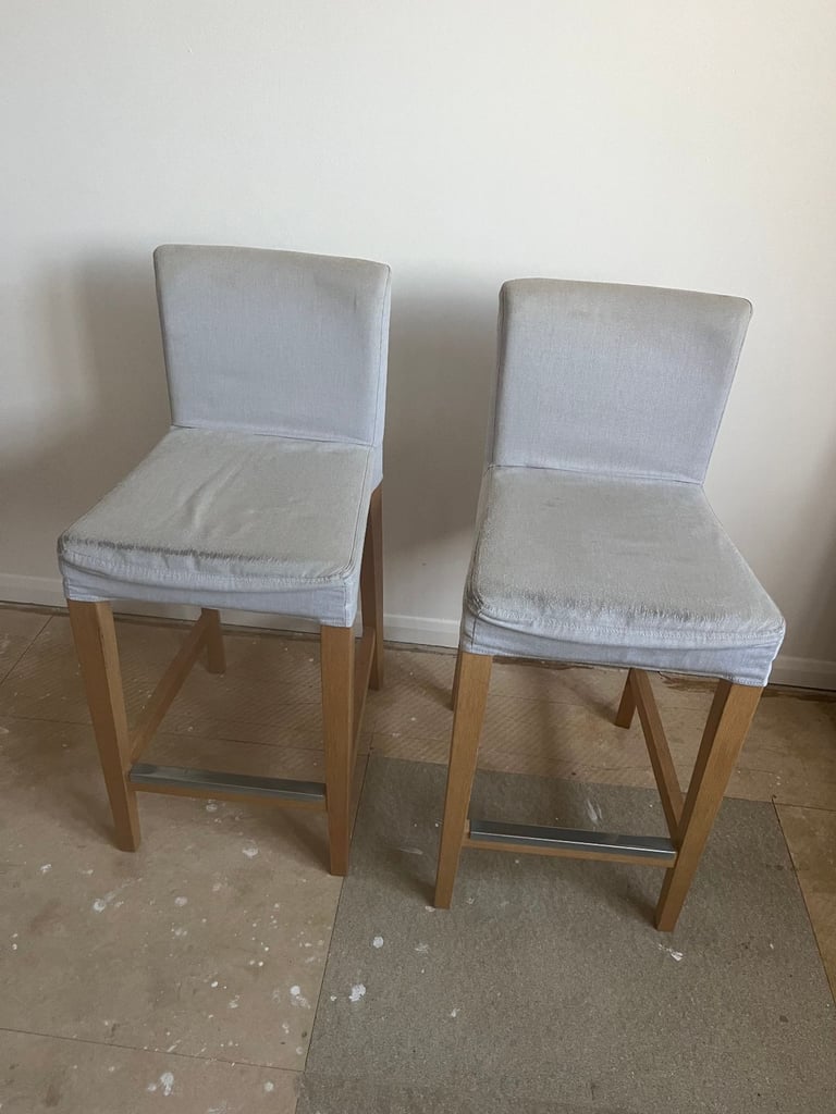 2 IKEA Bergmund Oak Bar Stools with removable covers