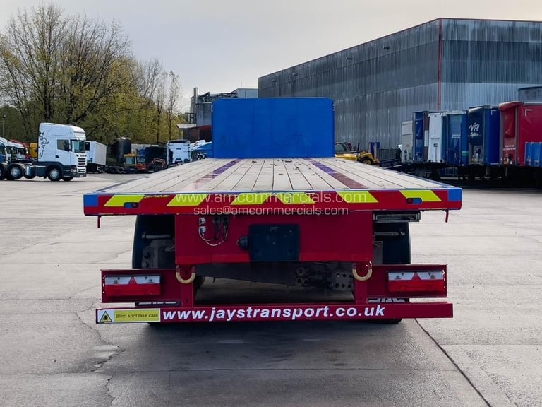 SDC TRI AXLE FLAT BED TRAILER 