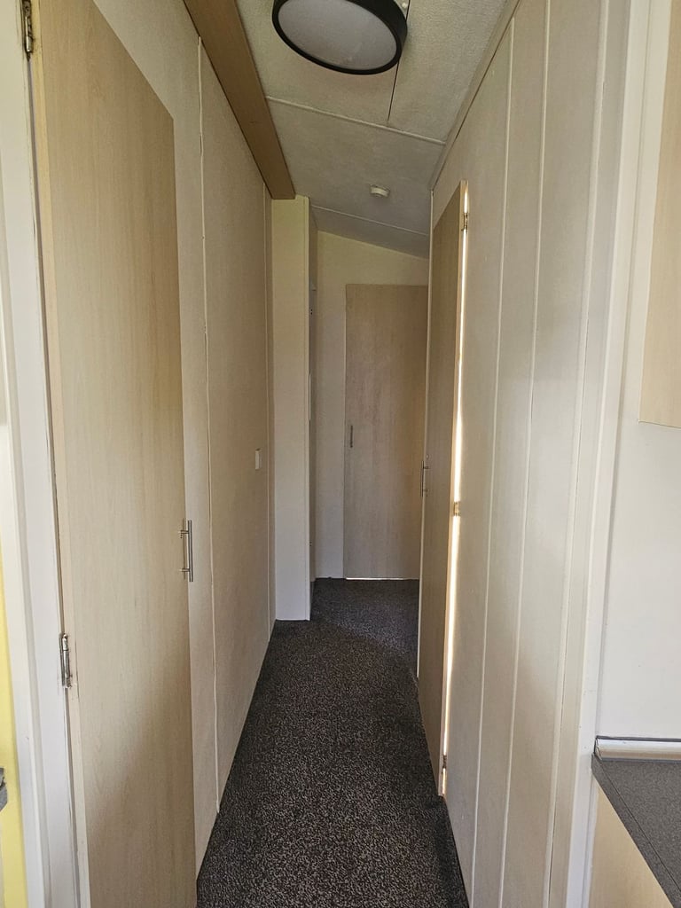 Static caravan with timber structure