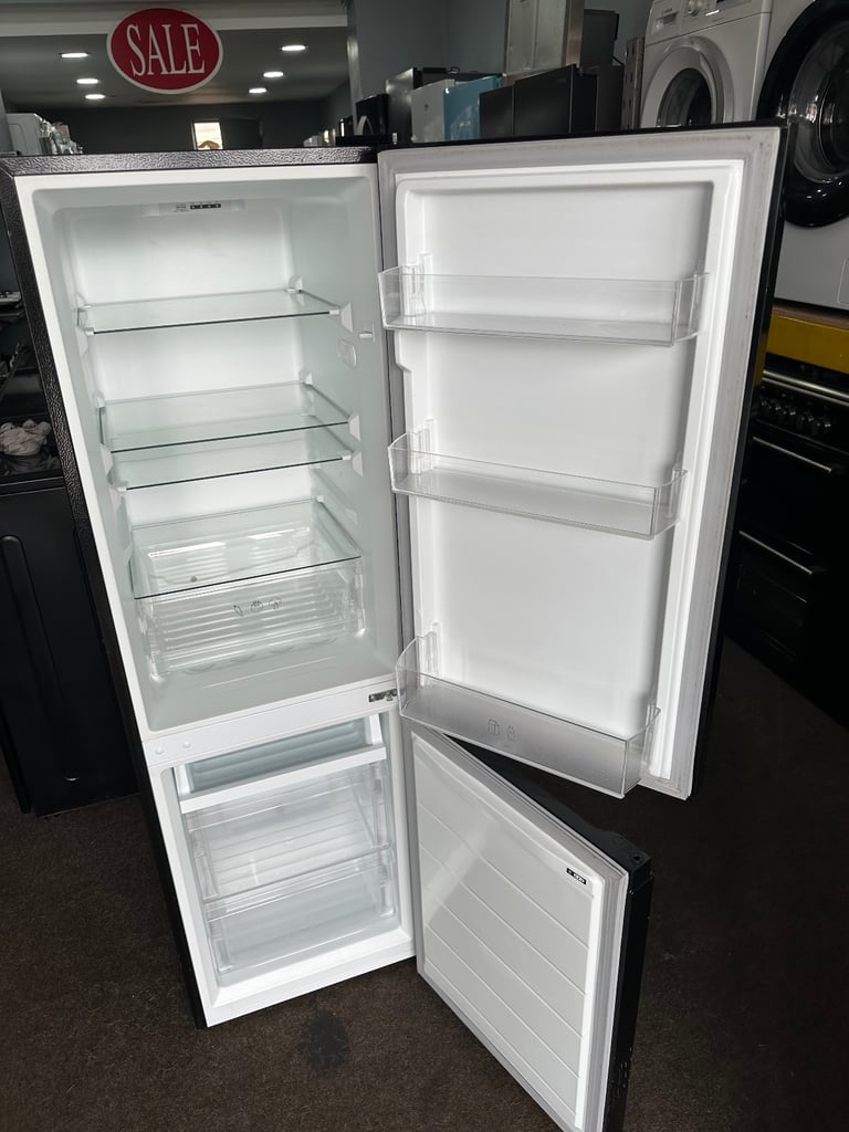 Logik black top condition frost free medium fridge freezer 