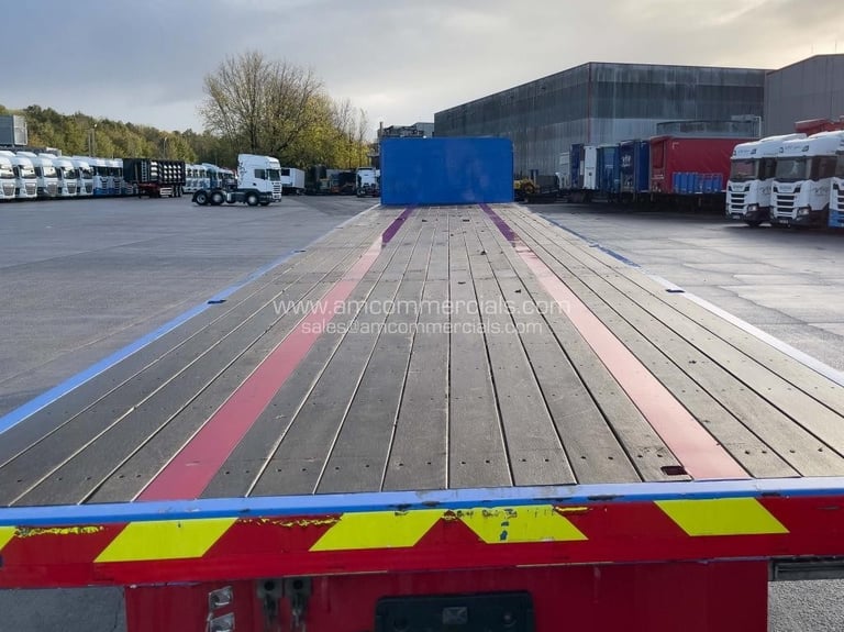 SDC TRI AXLE FLAT BED TRAILER 