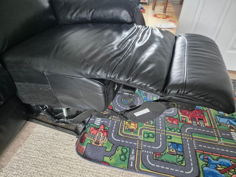 Two seater leather reclining sofa