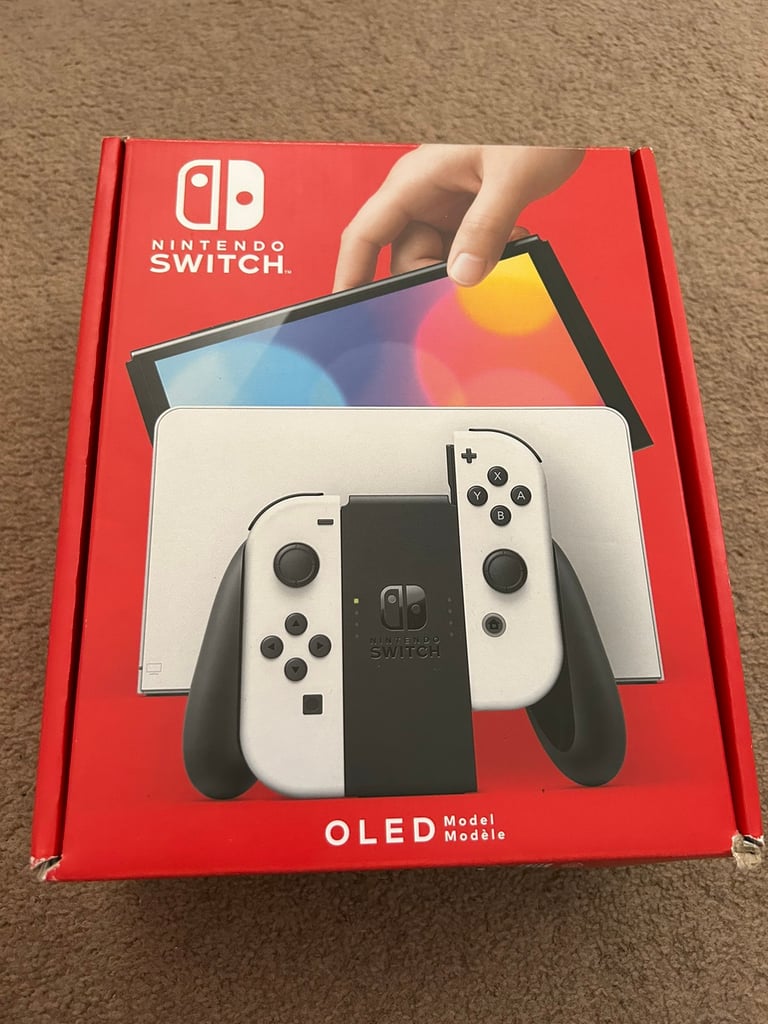 NINTENDO SWITCH OLED - White and boxed as new. 