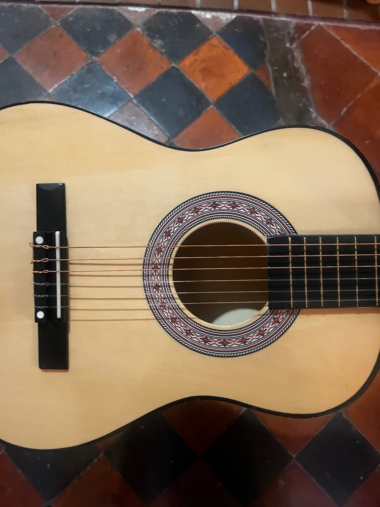 Children’s guitar with carry case