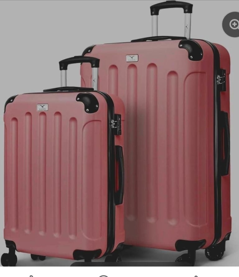 A new still boxed 2 pcs hard shell Suitcases 24inch x 20inch rosegold. 