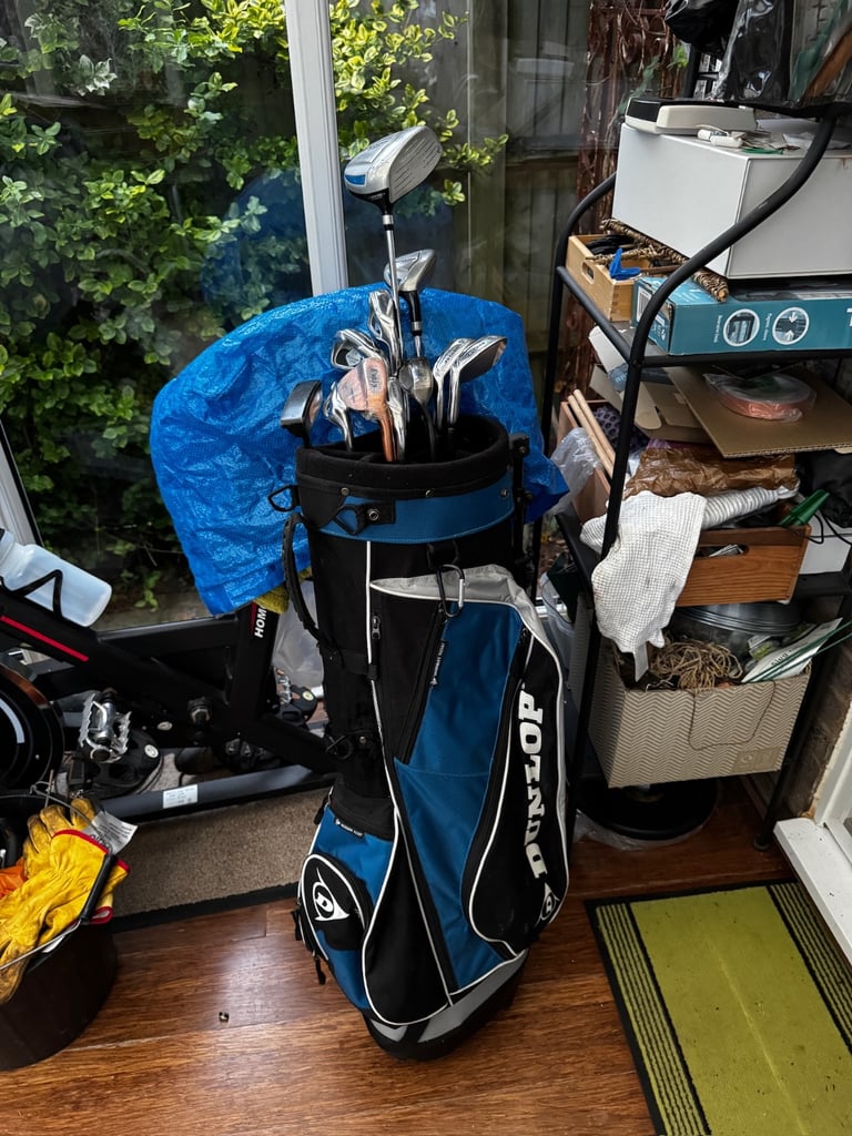image for Dunlop golf clubs in bag with integrated stand plus additional clubs and accessories 