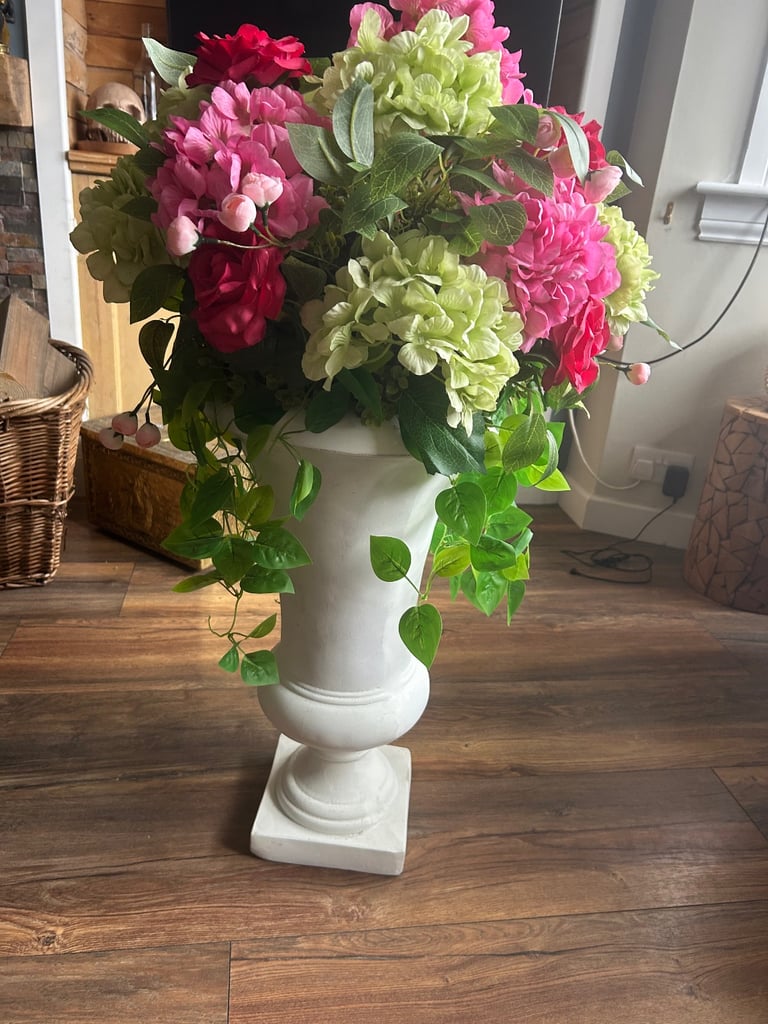 Artificial Flower Arrangement in stone pillar vase