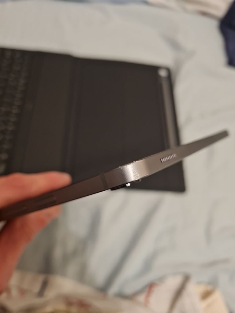 Samsung Galaxy Tab S9 FE, plus keyboard cover, and S Pen