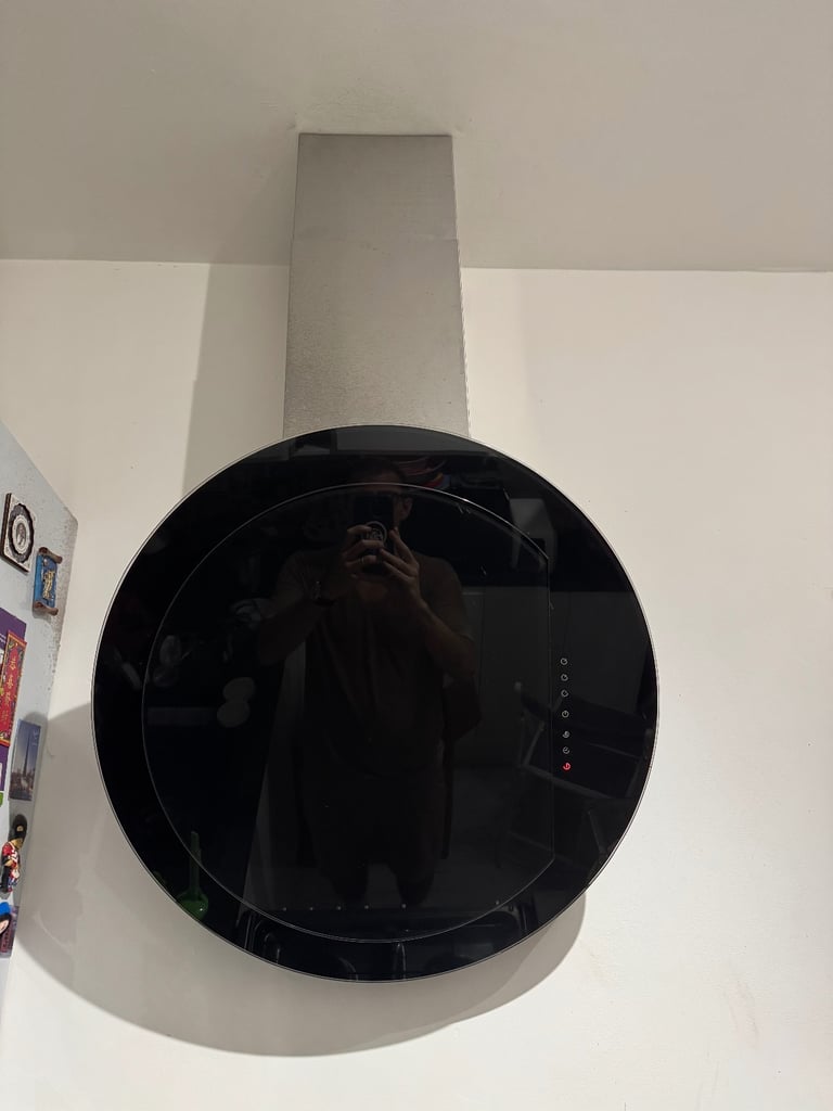 Modern and stylish black circular glass hood from Cooke & Lewis