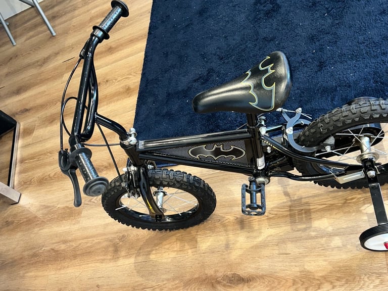 image for £60 kids bike 14 inch wheels size 
