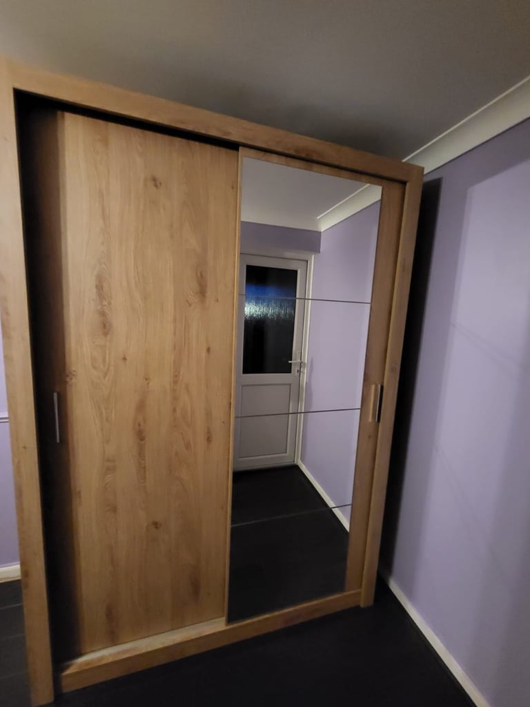 Large double wardrobe with mirror panel