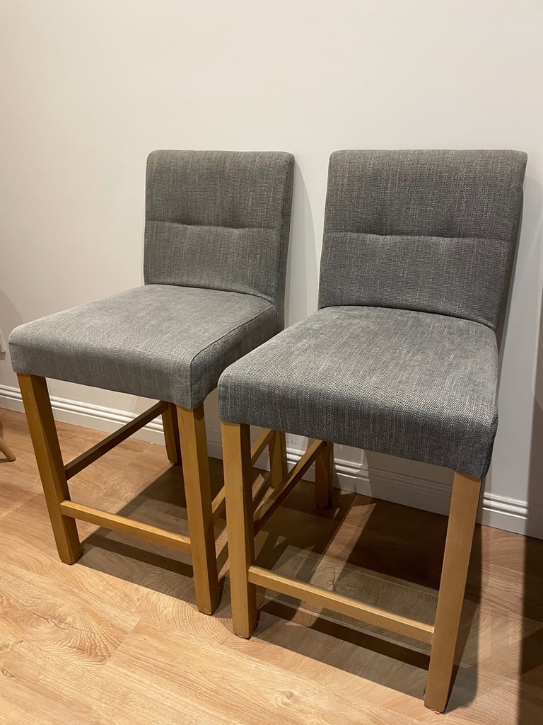 Two wooden & grey bar stools