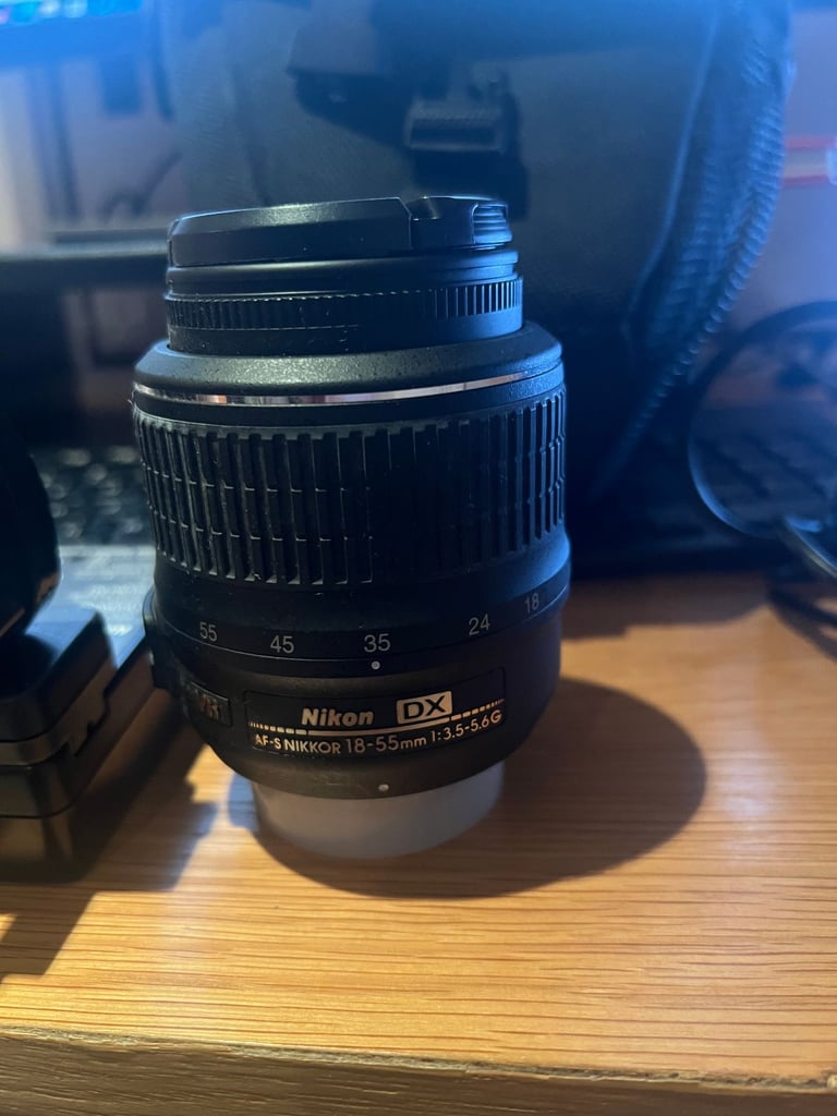 Nikon D3100 DSLR + 18-55mm VR Lens + Charger + Bag