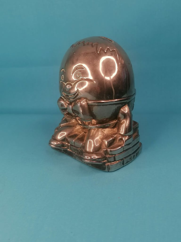 Vintage Humpty Dumpty Silver Plated Metal Coin Bank Money Box.. Missing one part.