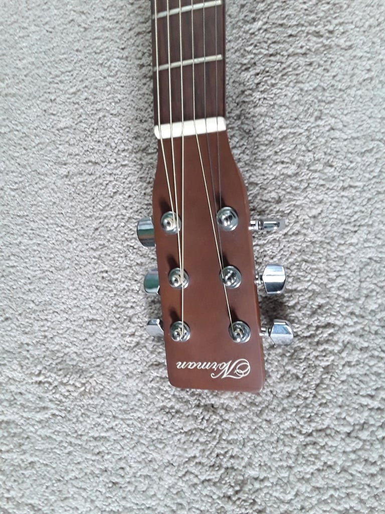 Left handed Norman B18 acoustic guitar, made in canada.