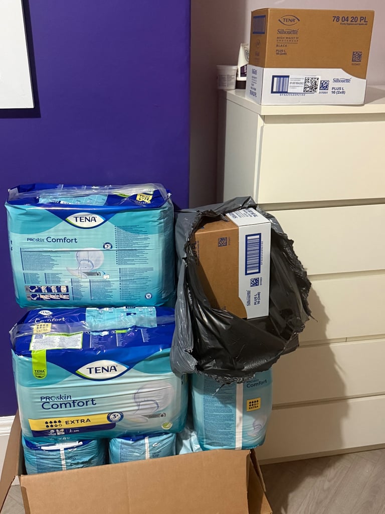 New unopened boxes of Incontinence pads