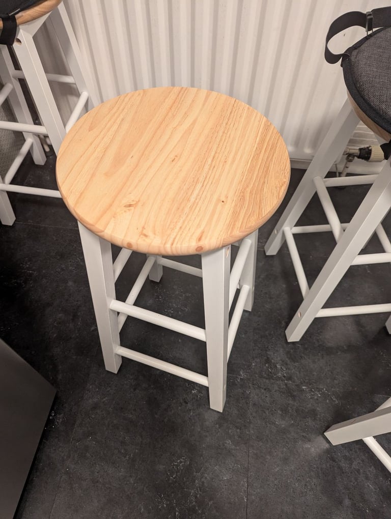 Habitat 4 as new wooden stools with clip of seatpads 