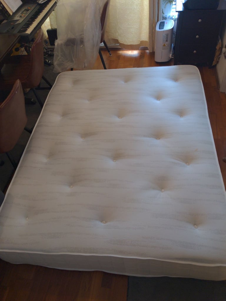 image for King size mattress with springs and foam top and bottom