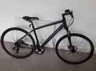 CARRERA CROSSFIRE 2 ADULTS HYBRID BIKE. (Like new)