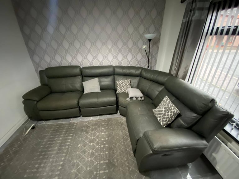 Modern corner group sofa   Some wee signs of wear and the recliner handle etc  £175