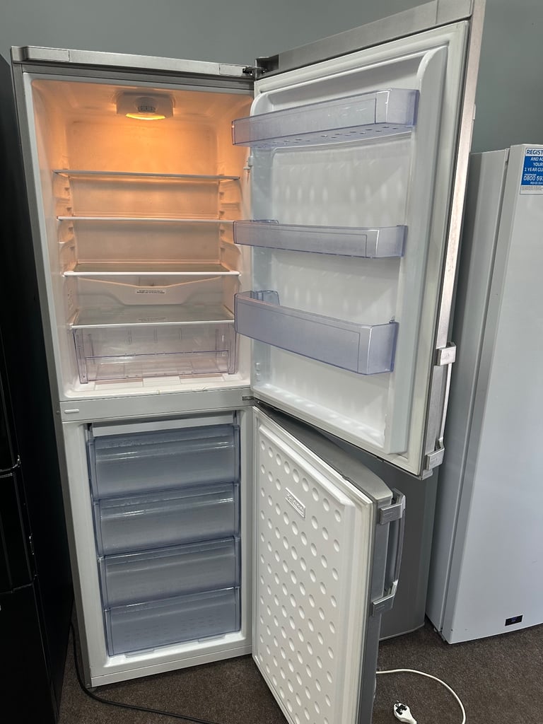 BEKO tall silver good condition frost free fridge freezer 