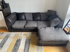 Black and grey L-shaped corner sofa