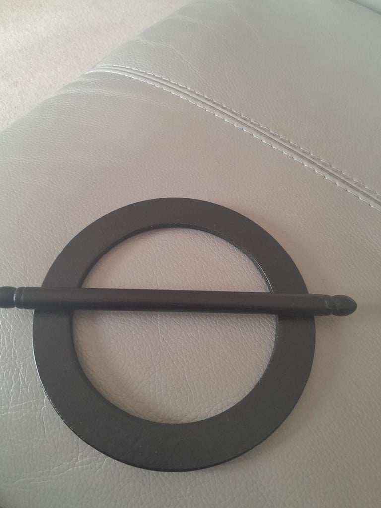 Curtain ring tieback