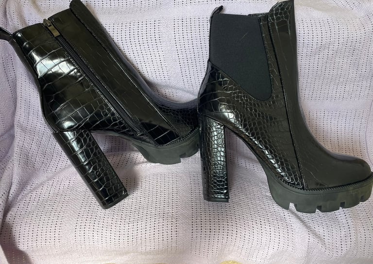 Women’s black heeled boots