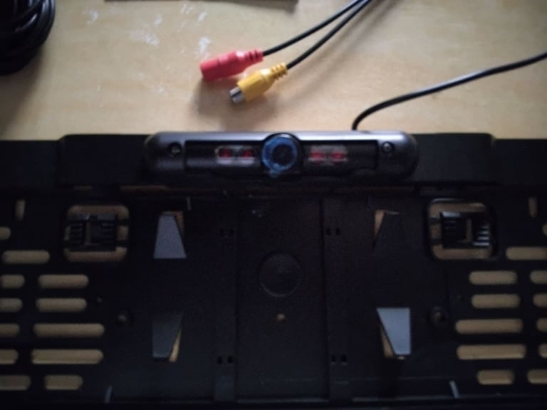 Car rear number plate holder with camera