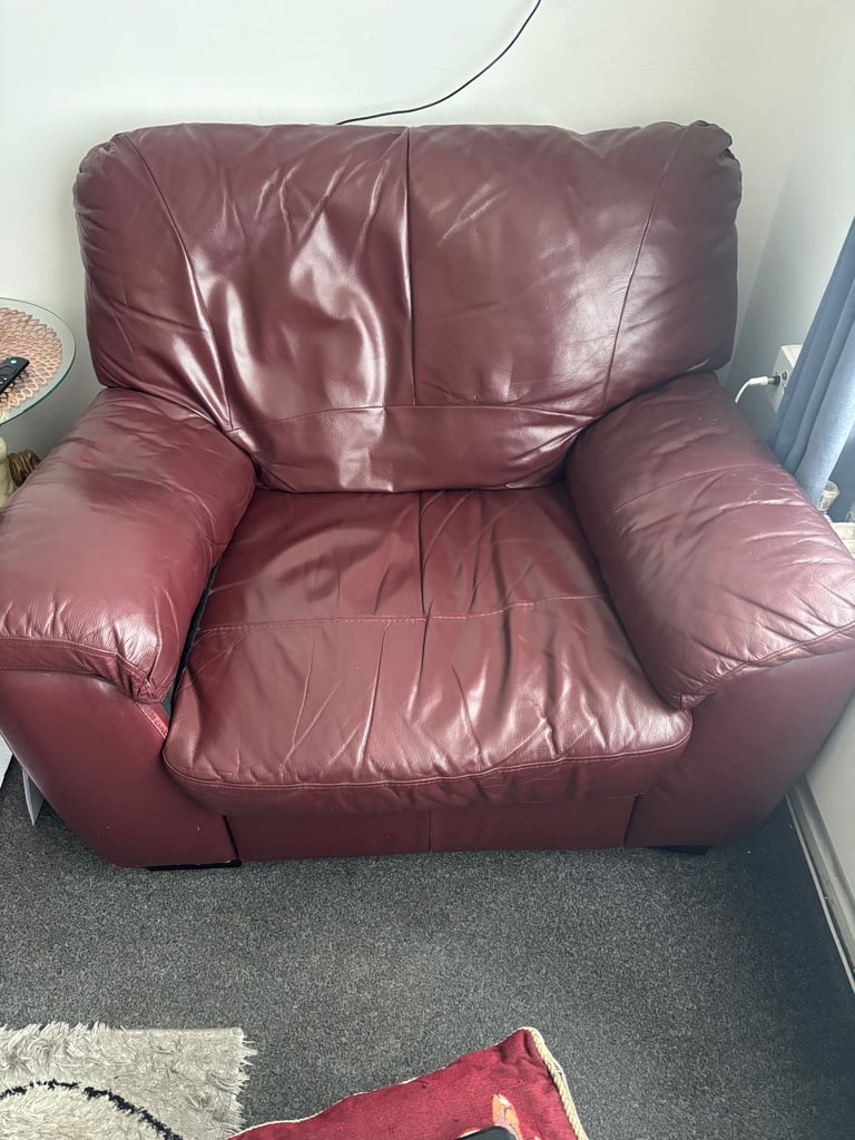 Burgundy leather 3 seater and chair 