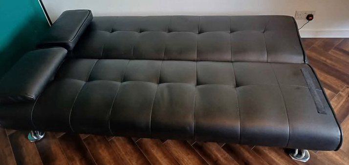 Leather sofa bed like new (can deliver)