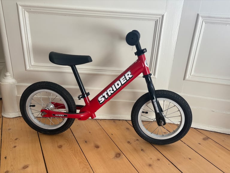 image for Strider red balance bike 