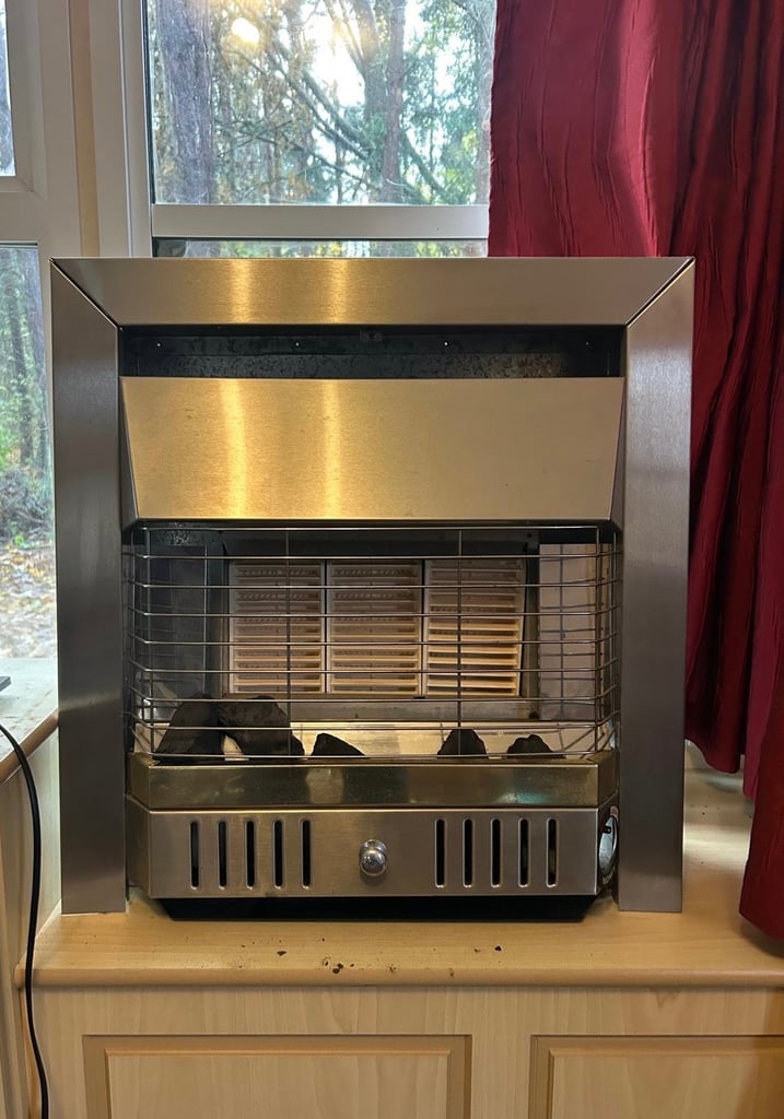 Gas fire. Perfect working order. 