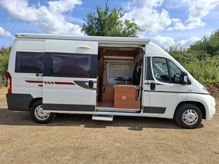 Adria Twin SF. 2013. Rear French Bed. Half dinette hosts 5.