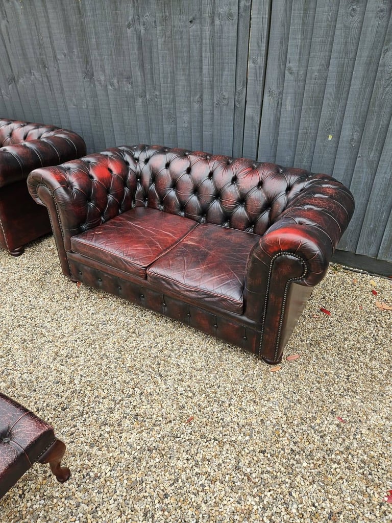 Original vintage 2 seater chesterfield sofa in classic oxblood.
