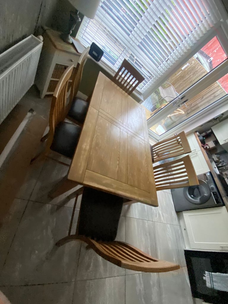 image for Oak wood dining room table   Couple of we marks but not noticable HENCE THE PRICE   Only £69