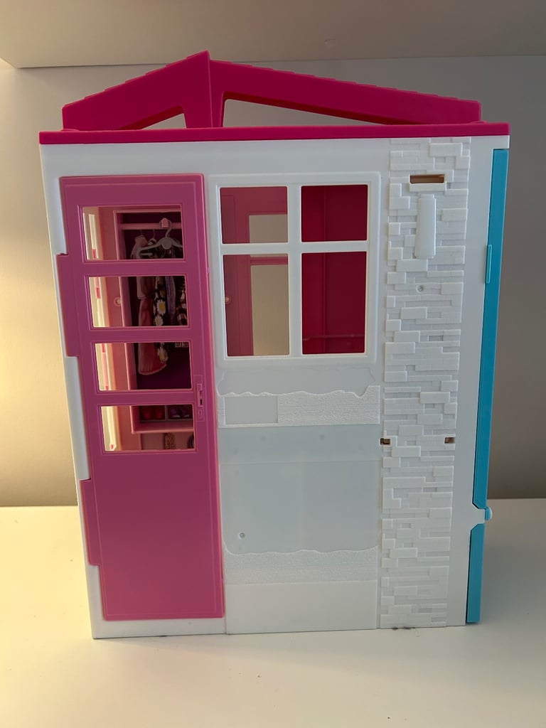 Barbie portable house and dolls bundle