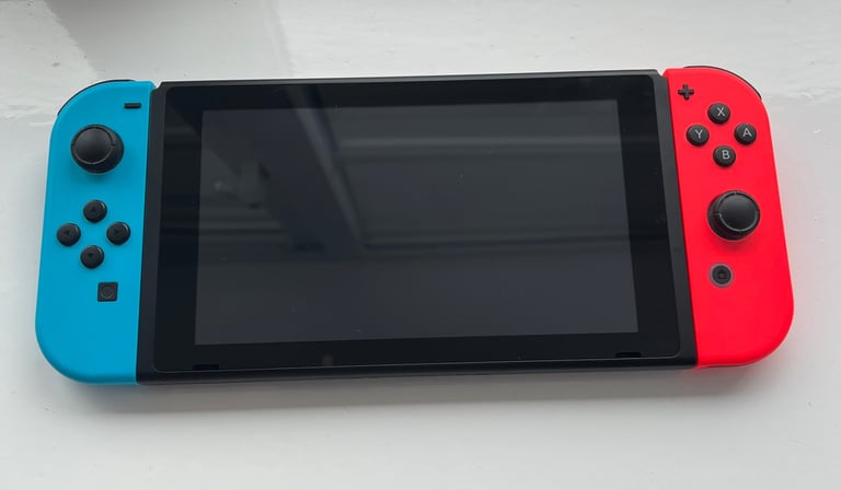 Boxed Switch 1 Neon Red & Blue with Carrier Case