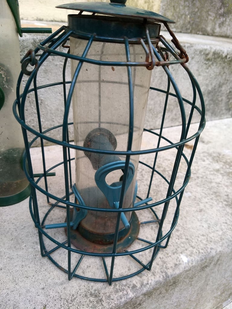 Bird feeders. 3 different types. take nuts and seeds.