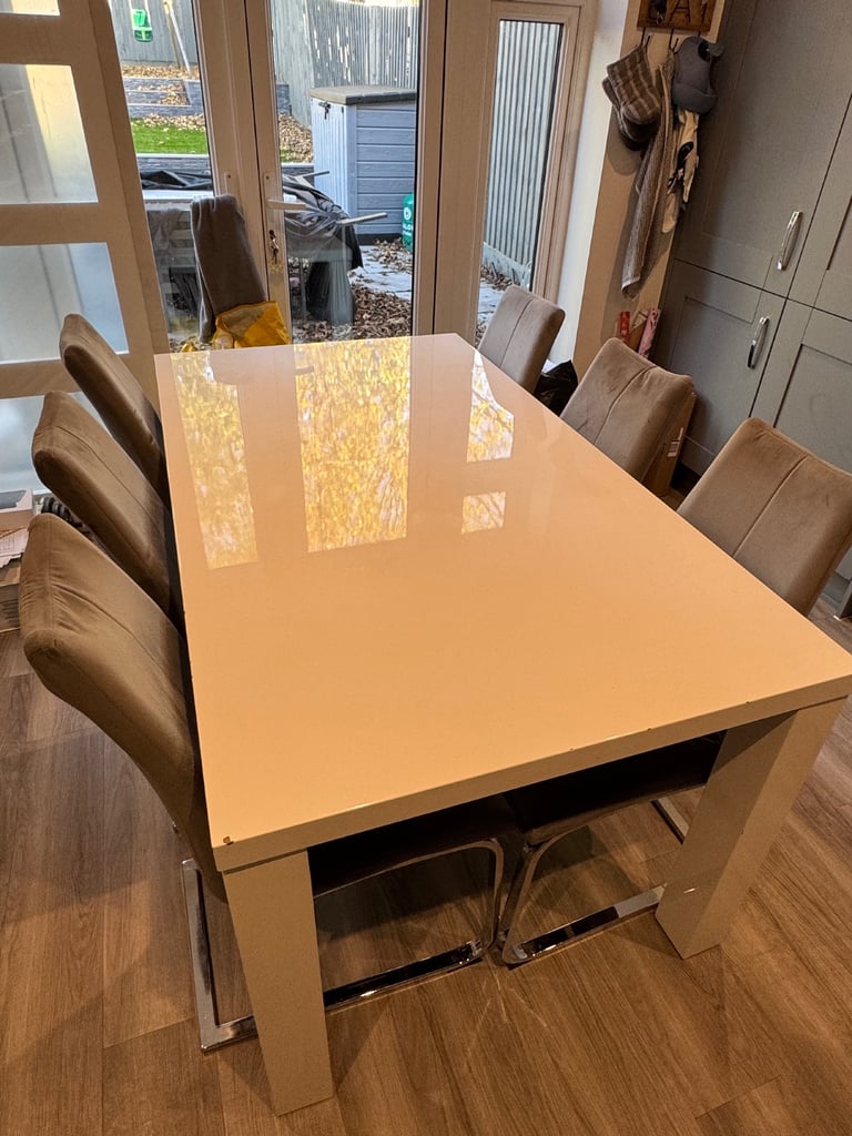 image for White Gloss Dining Table plus 6 grey velvet chairs from Next