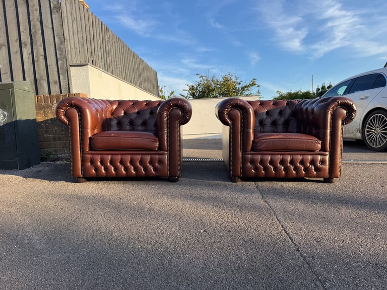 Pair of chesterfield faux brown leather club armchairs 