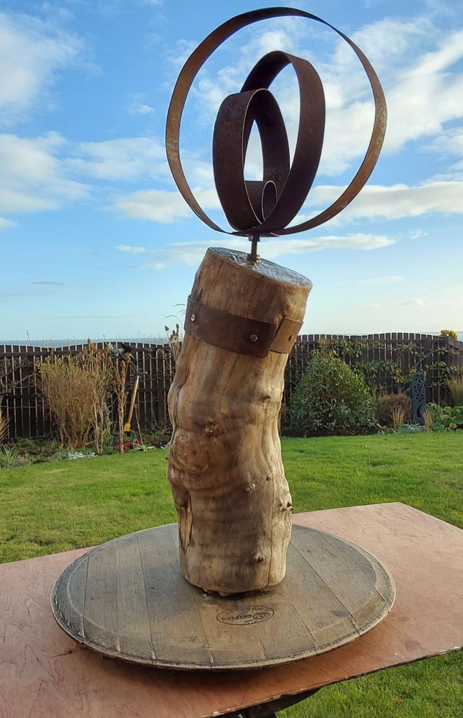 image for Garden sculpture handcrafted from a recycled whisky barrel 