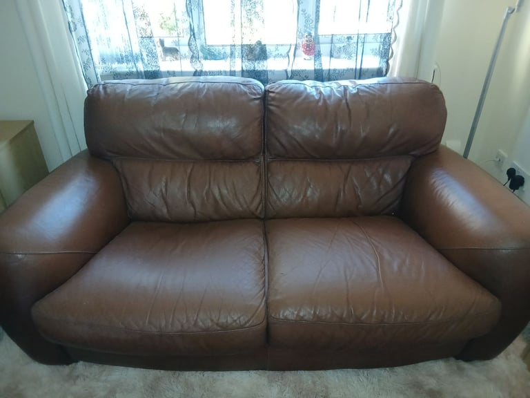 image for Large brown leather sofa