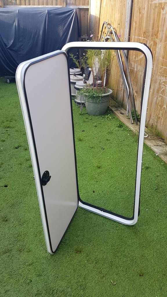 Various side doors with frames and keys for caravan camper motorhome - gas, toilet, storage.